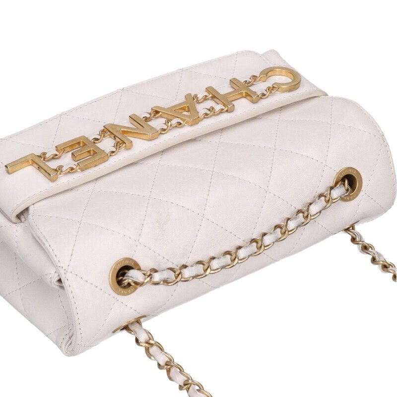 CHANEL Metal Logo Quilted Shoulder Bag