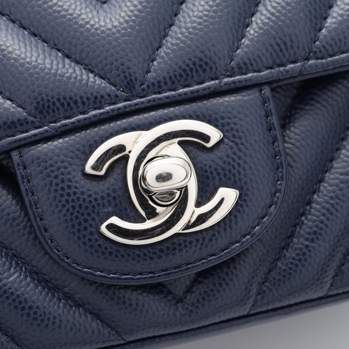 CHANEL Chevron V-Stitch Mini Caviar Navy Shoulder Bag