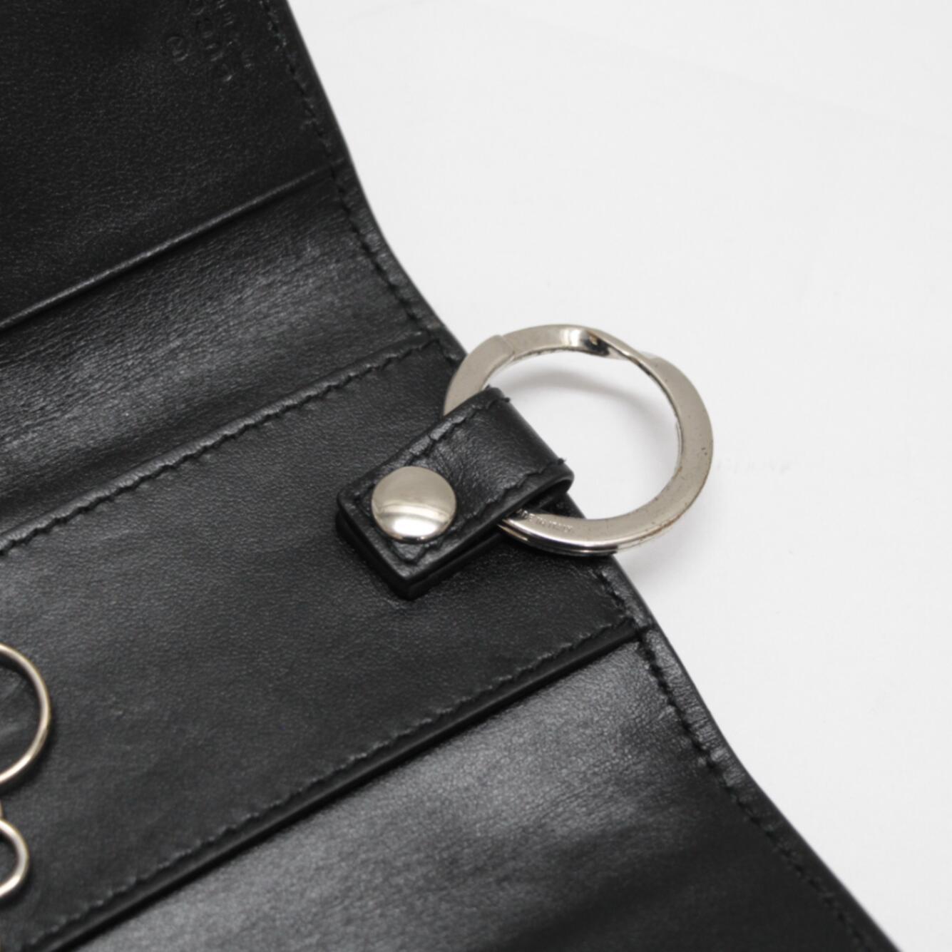 GUCCI GG Embossed Leather Key Case Black