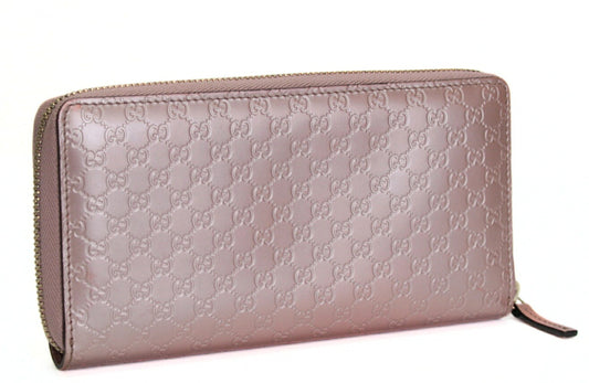 GUCCI Microguccissima PVC Zip Around Wallet Pink