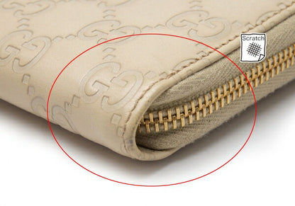 GUCCI Guccissima GG Round Zip Wallet Ivory