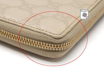 GUCCI Guccissima GG Round Zip Wallet Ivory