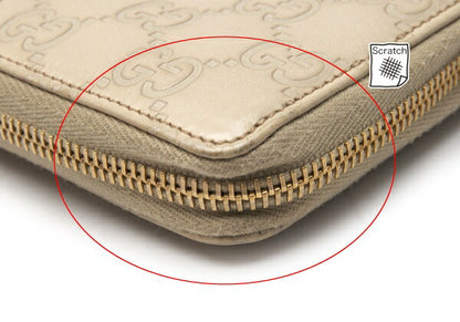 GUCCI Guccissima GG Round Zip Wallet Ivory