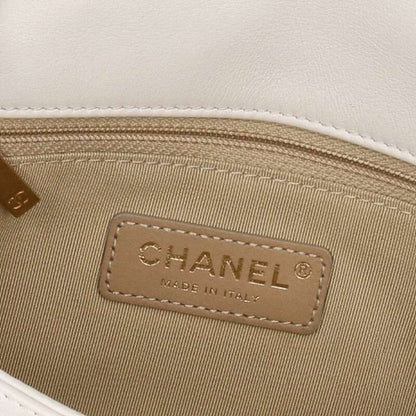 CHANEL Metal Logo Quilted Shoulder Bag
