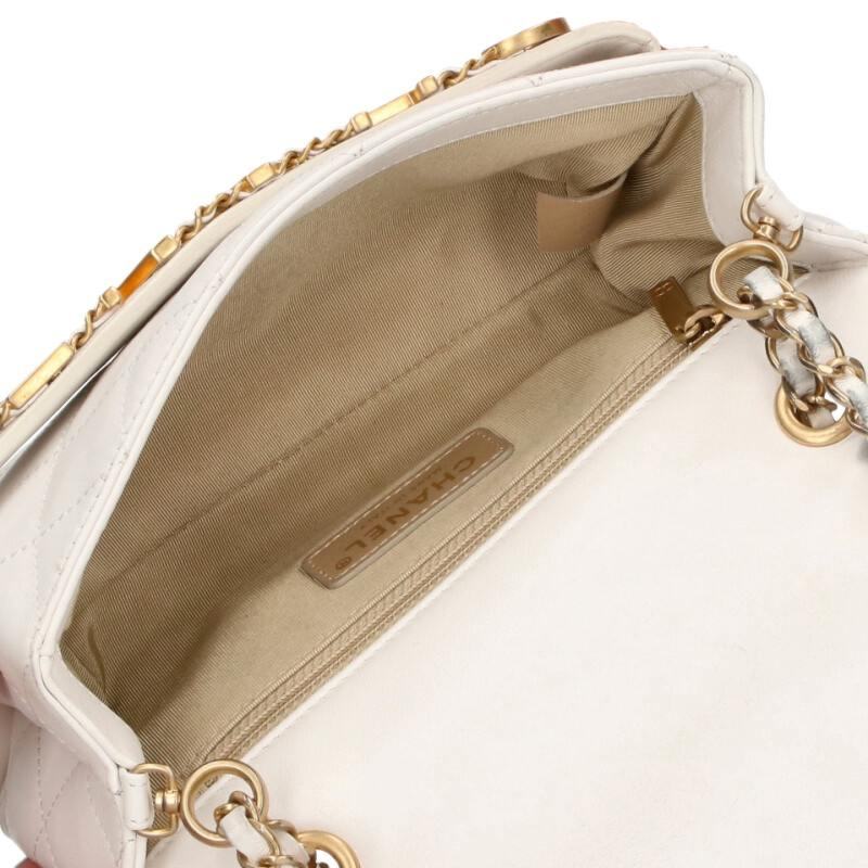 CHANEL Metal Logo Quilted Shoulder Bag