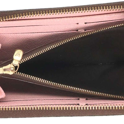 Louis Vuitton Monogram leather zipper Wallet Brown