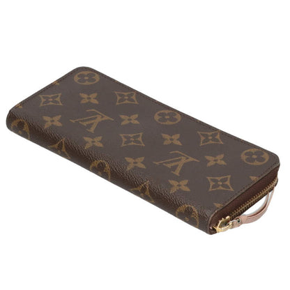 Louis Vuitton Monogram leather zipper Wallet Brown