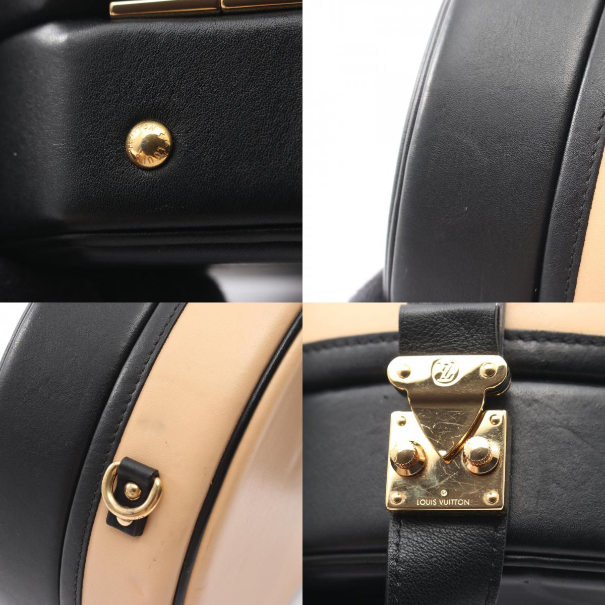 LOUIS VUITTON Petite Boîte Leather Bag