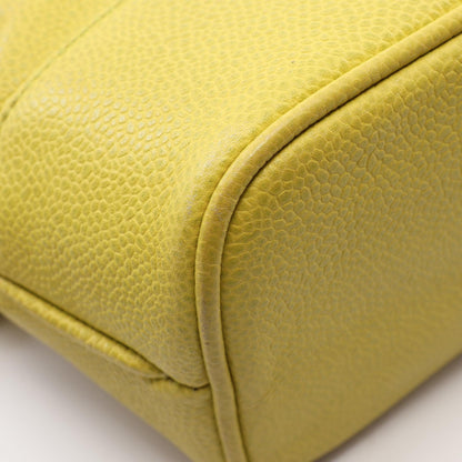 CHANEL Coco Mark Caviar Backpack Yellow