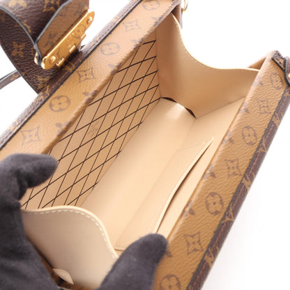 LOUIS VUITTON Petite Malle Bag Brown