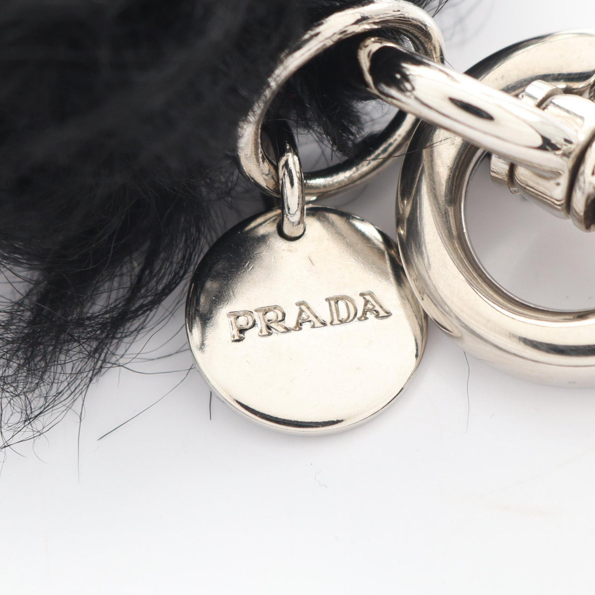 PRADA Rufus Fur Metal Charm Black