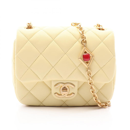 CHANEL Mini Matelassé Lambskin Bag Yellow