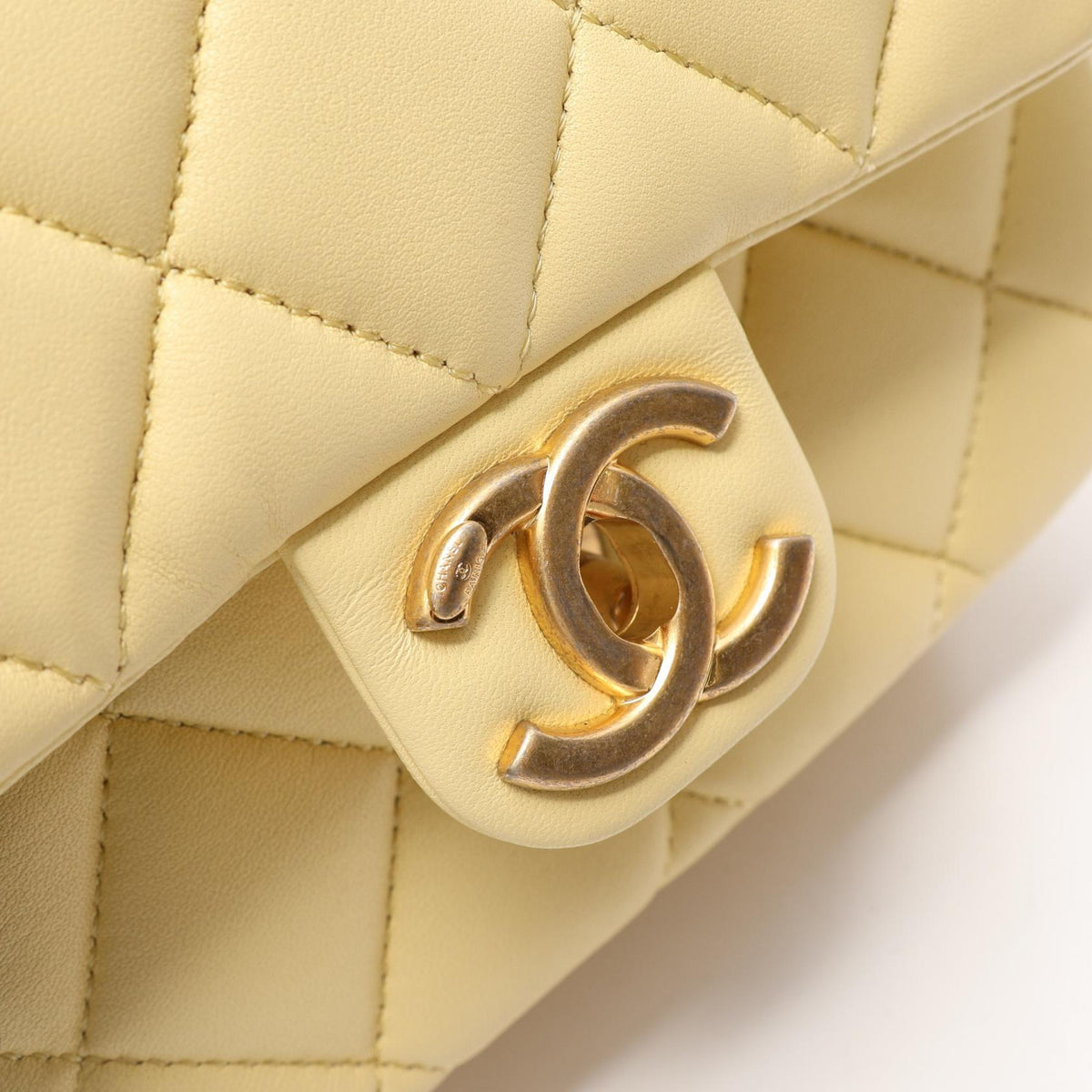 CHANEL Mini Matelassé Lambskin Bag Yellow