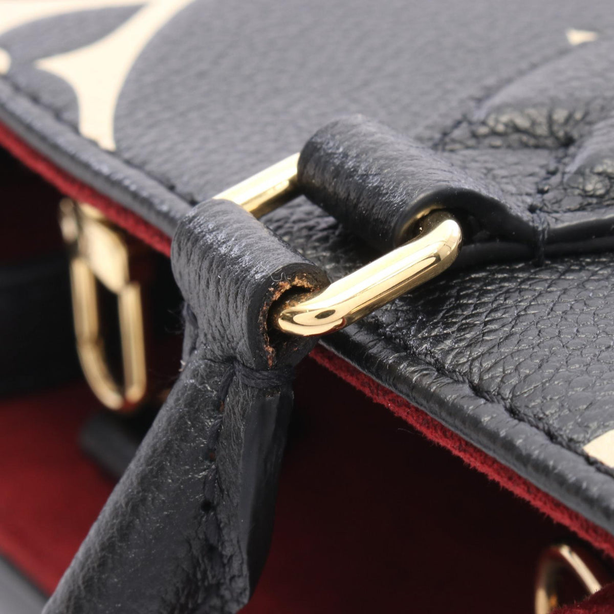LOUIS VUITTON OnTheGo PM Leather Handbag