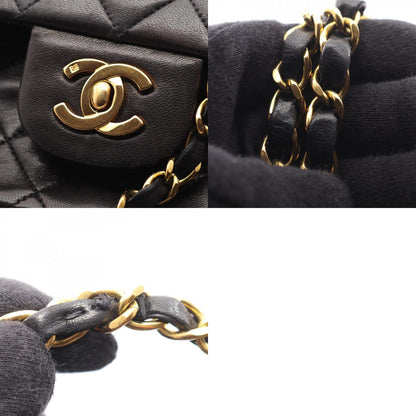 CHANEL Matelassé Double Flap Bag Black