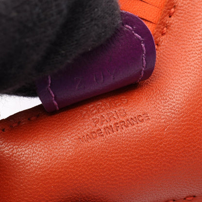 HERMES Rodeo PM Carnelian Lambskin Charm