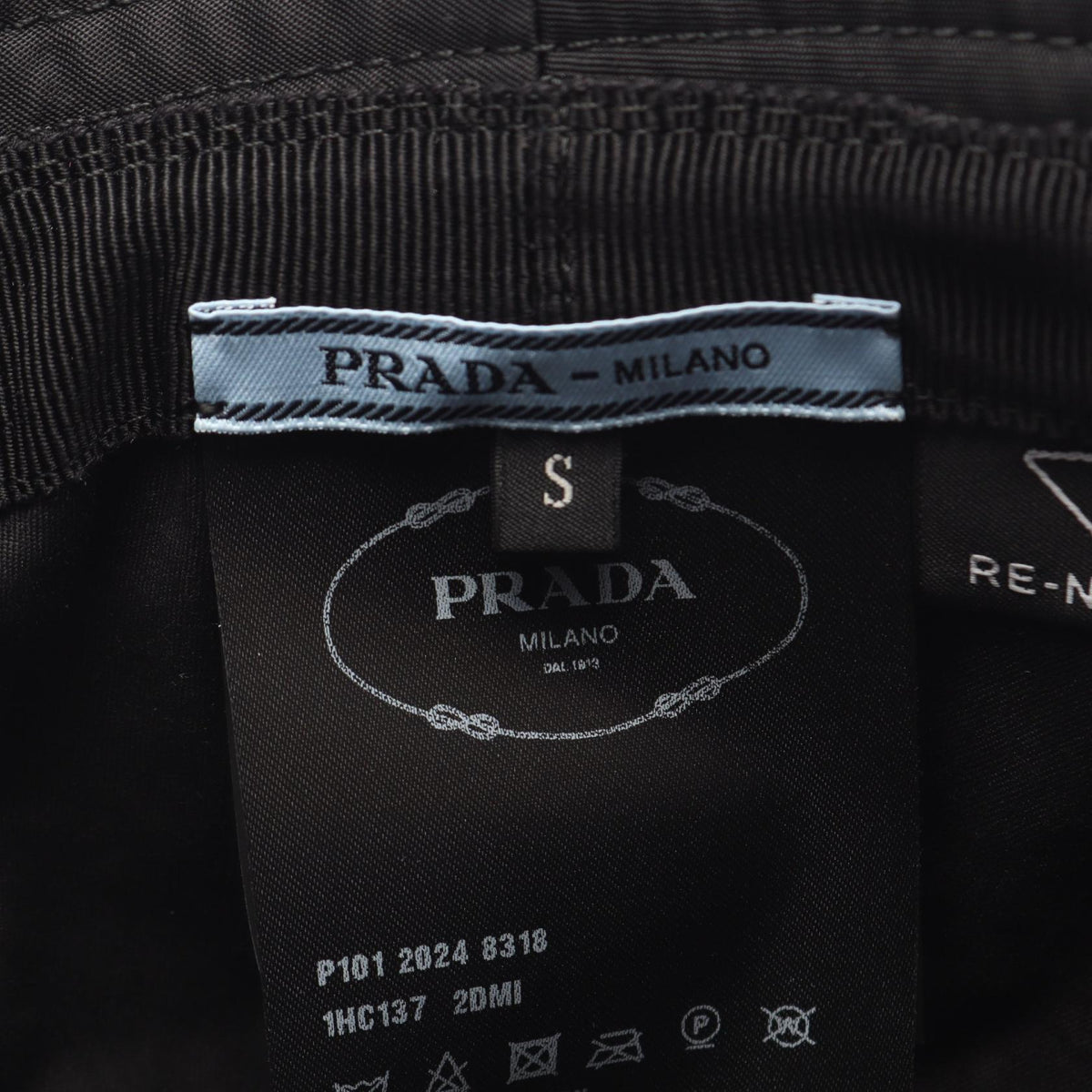 PRADA Re-Nylon Triangle Plate Bucket Hat Size S