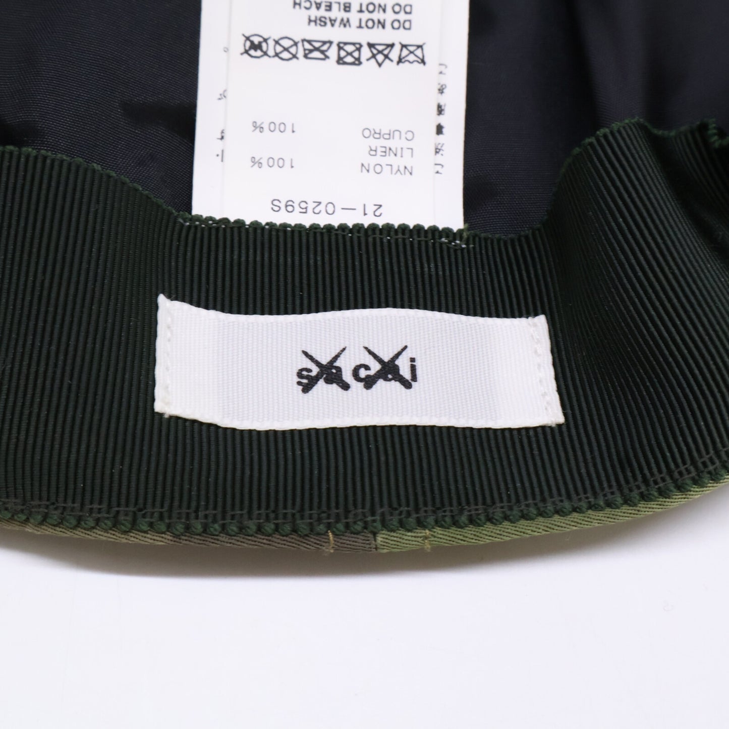 sacai KAWS 21SS Camo S-Logo Nylon Cap Green Size ONE SIZE