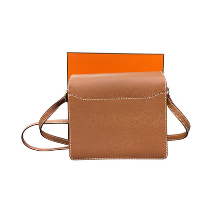 HERMÈS "Roulis Mini" Gold Evercolor Bag Gold