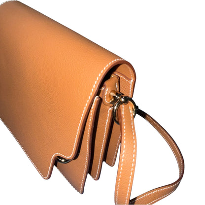 HERMÈS "Roulis Mini" Gold Evercolor Bag Gold
