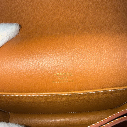 HERMÈS "Roulis Mini" Gold Evercolor Bag Gold