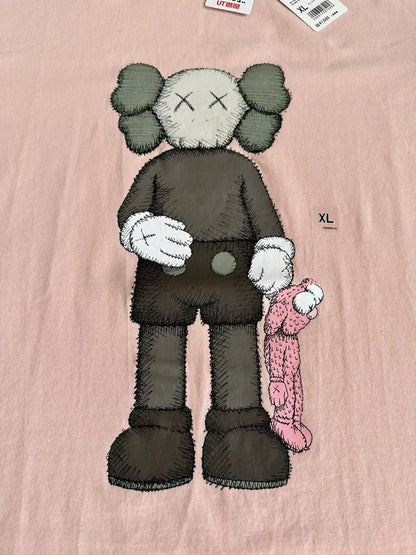 Vintage UNIQLO Tops - UNIQLO x KAWS Short Sleeve T-Shirt Peach XL - Authentic Archive
