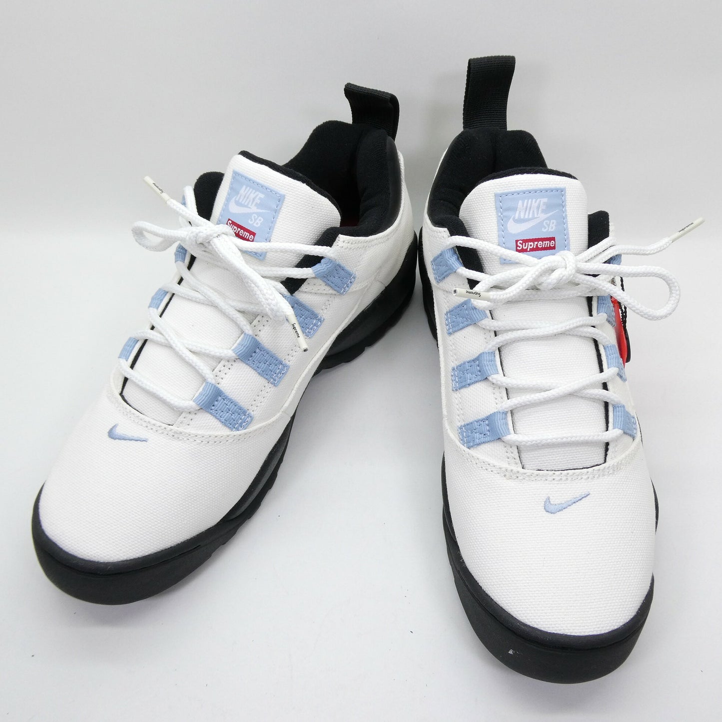 Supreme x Nike SB Darwin Low Sail Border Blue Sneakers