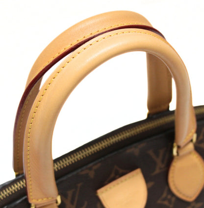 Louis Vuitton Rivoli PM Monogram Bag Brown Size ONE SIZE
