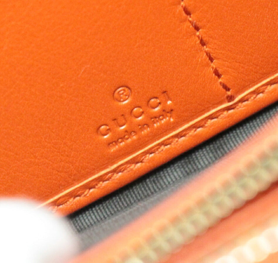 GUCCI Guccissima Round Zip Wallet Orange Size ONE SIZE