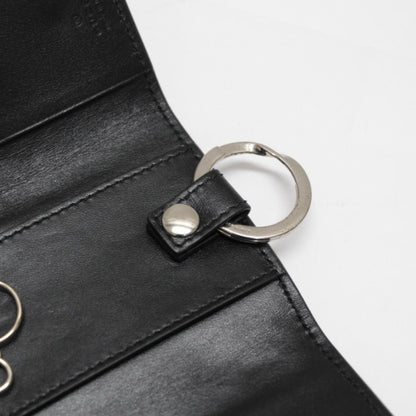 GUCCI GG Embossed Leather Key Case Black