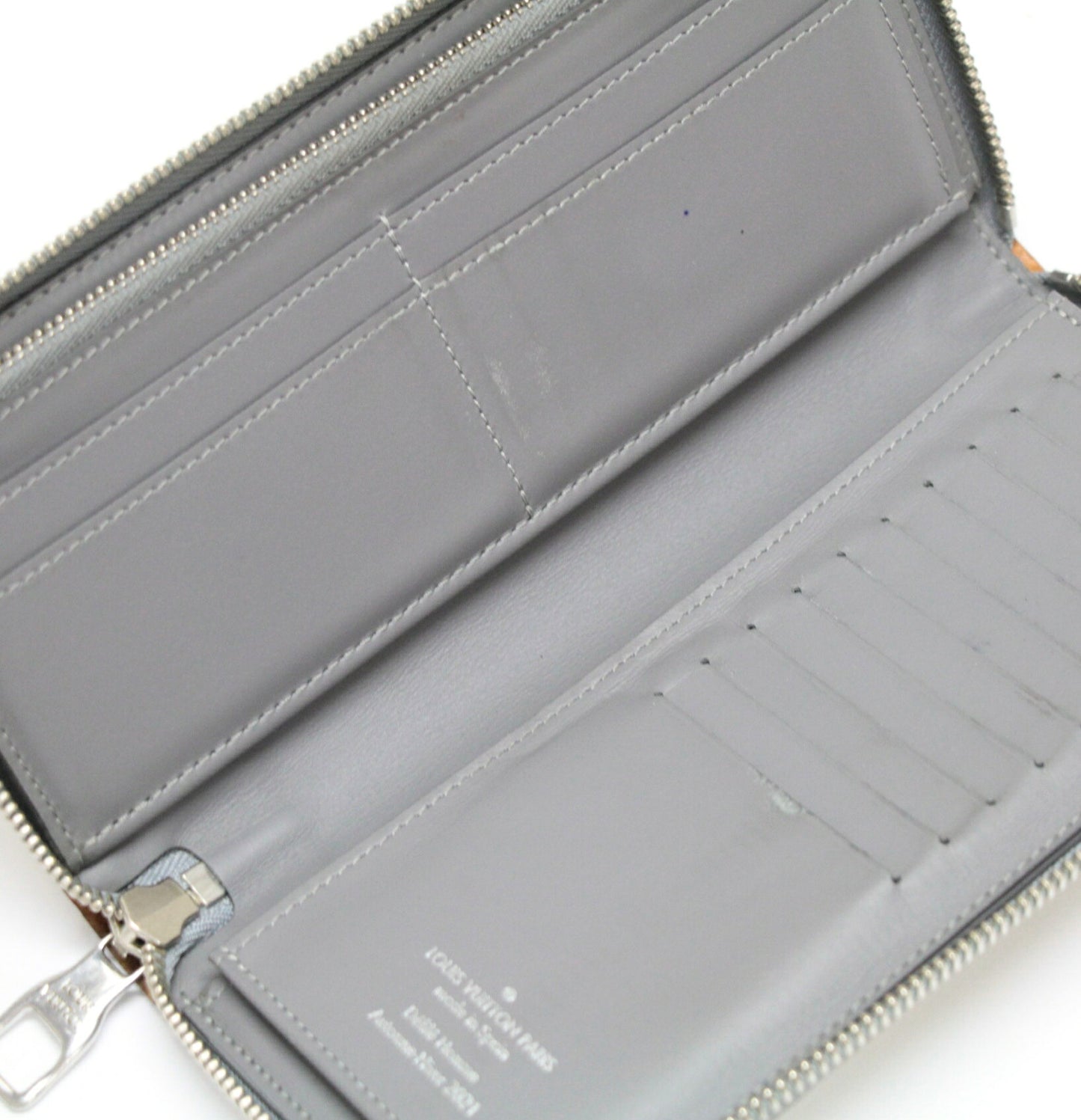 Louis Vuitton Zippy Vertical Wallet Silver Size ONE SIZE