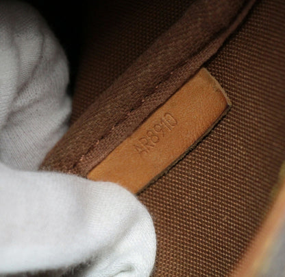 Louis Vuitton Saumur 35 Monogram Brown Mules