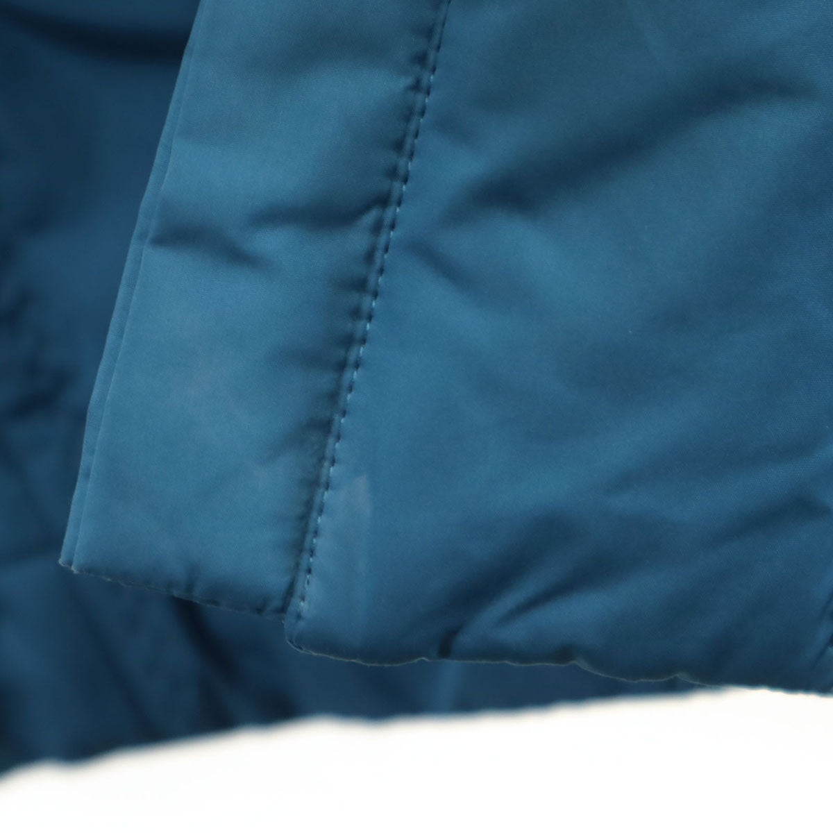 PLEATS PLEASE ISSEY MIYAKE. Japanese Padded Coat Blue